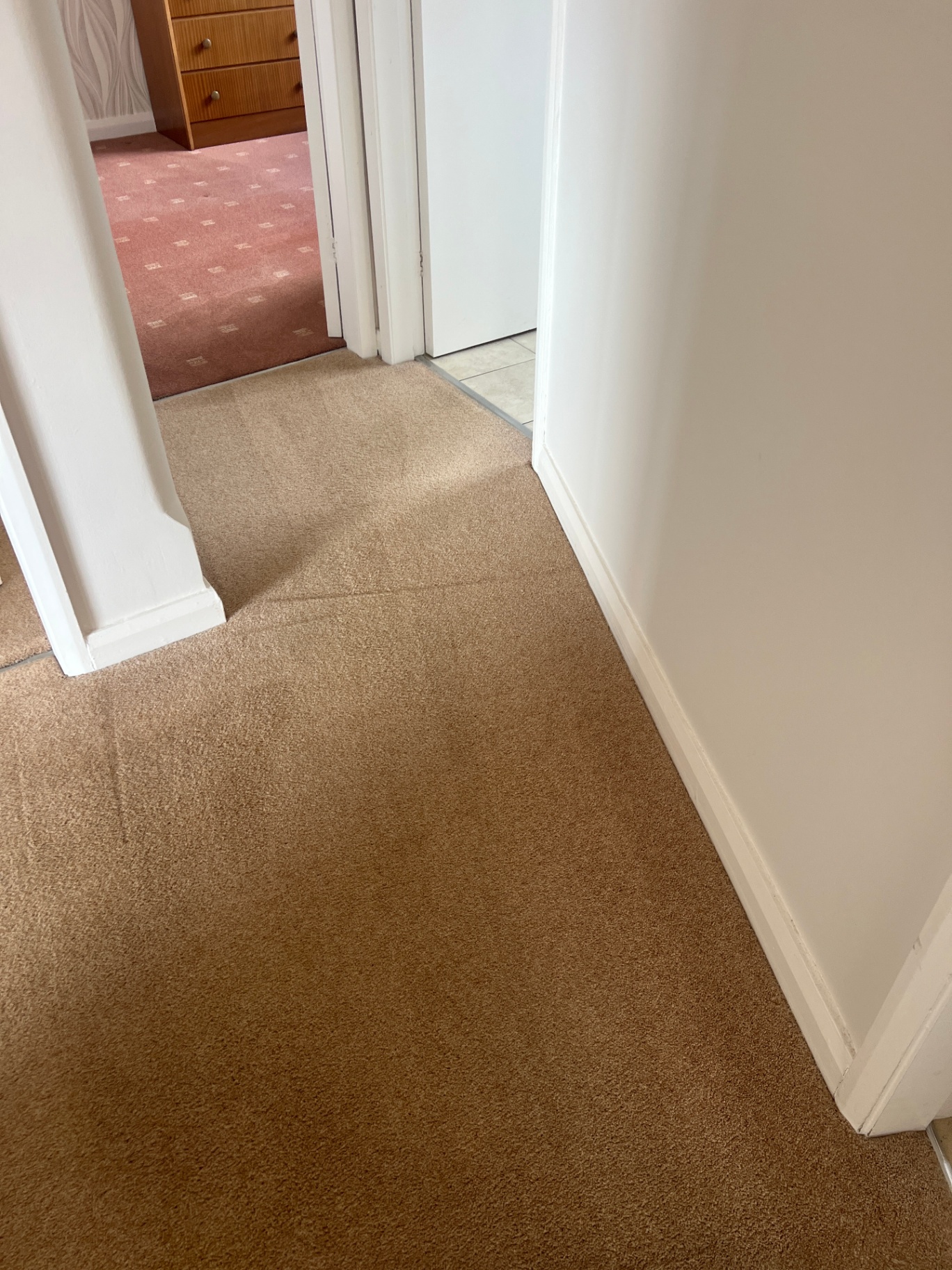 Hallway carpet stain removal before and after in Stafford, after professional cleaning