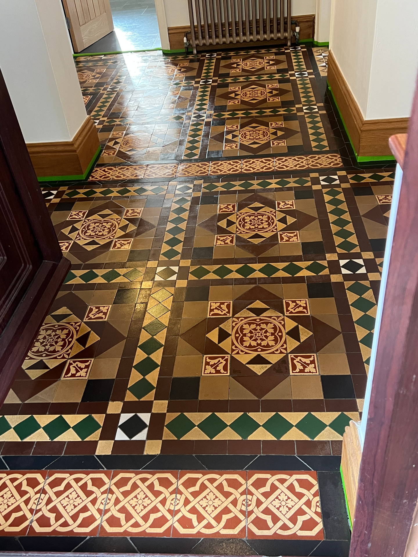 Restored Victorian tiled hallway floor in Stafford after professional cleaning